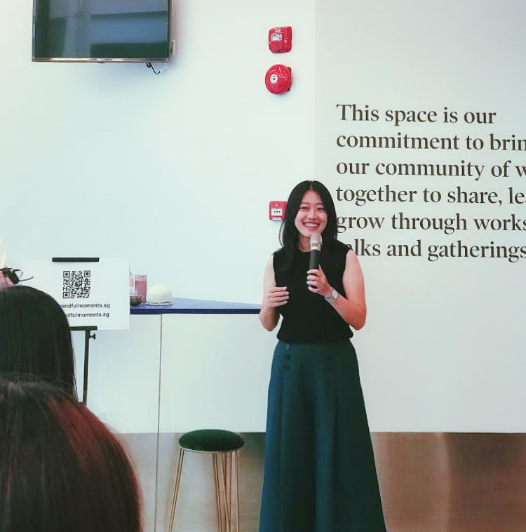 Erin speaking at a Love, Bonito community gathering
